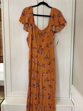 Floral Romper with Flutter Sleeves